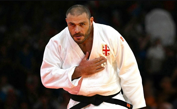 გურამ თუშიშვილმა მეოთხედფინალში ტედი რინერთან დამარცხების შემდეგ დისკვალიფიკაცია მიიღო და ასპარეზობიდან მოიხსნა